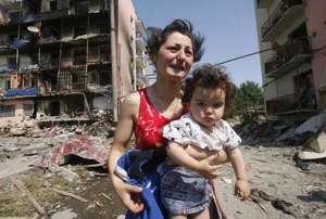 Georgian woman and child during the war of 2008.  (Reuters/David Mdzinarishvili)