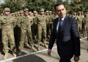 Alasania reviews the troops (Voice of America)